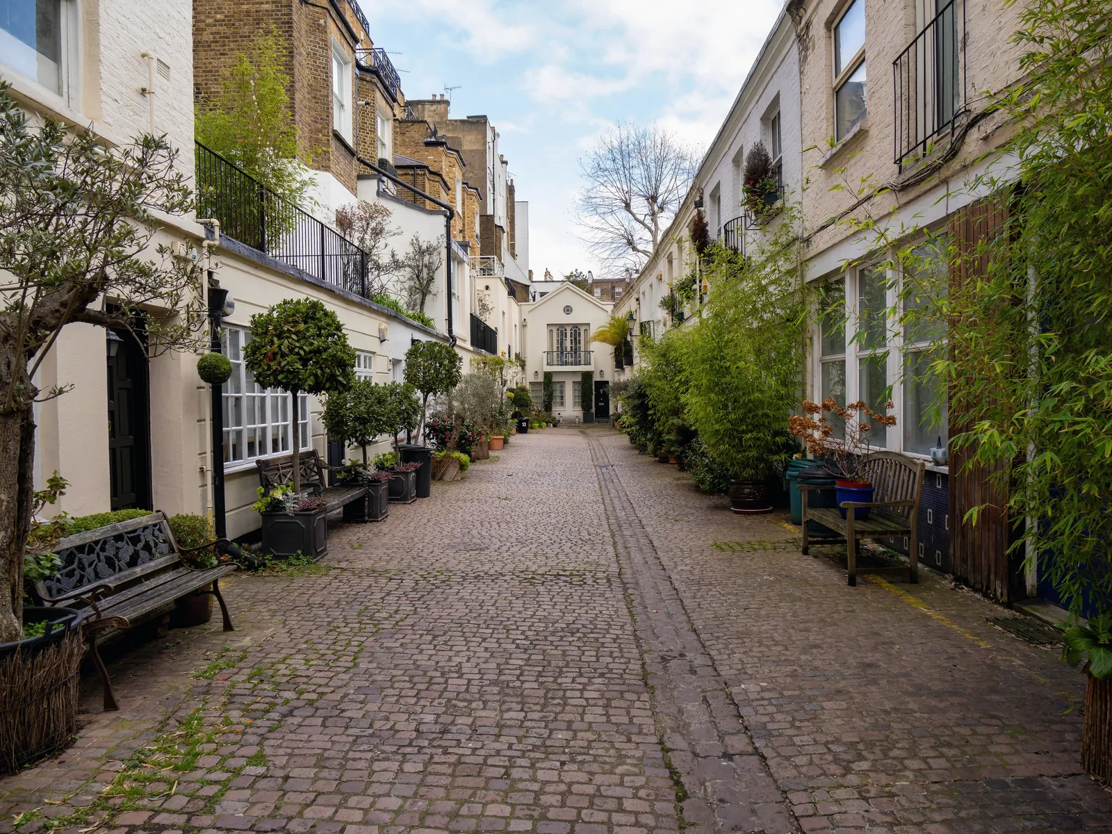 A quiet cobbled mews in London.